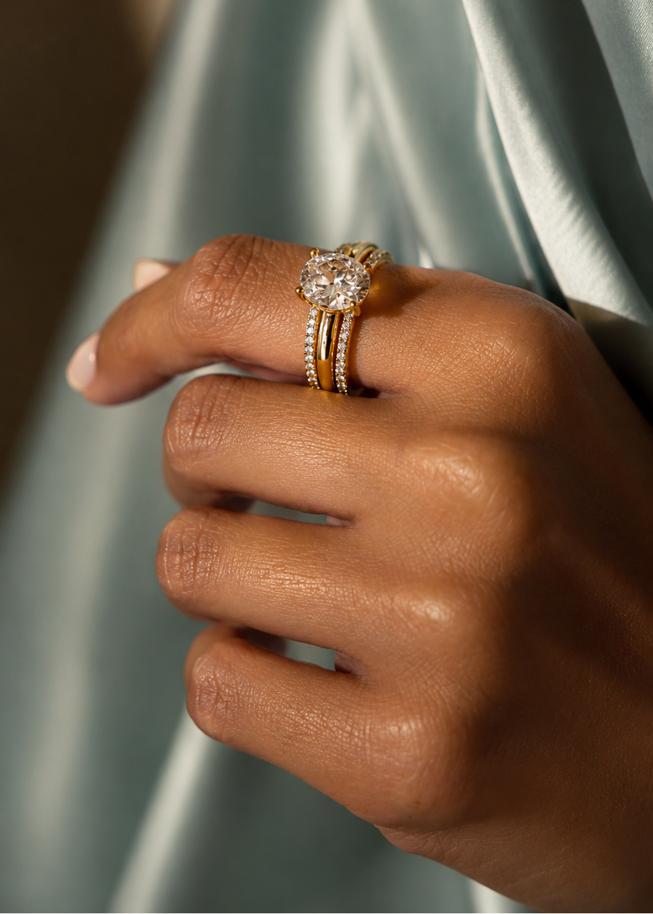 Eva Rings worn together on hand for a layered stacking look